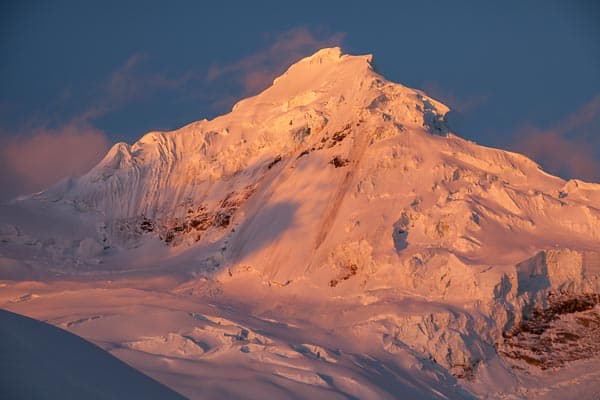 Sunset Alpenglow on the West Face of Tocllaraju as seen from Base Camp